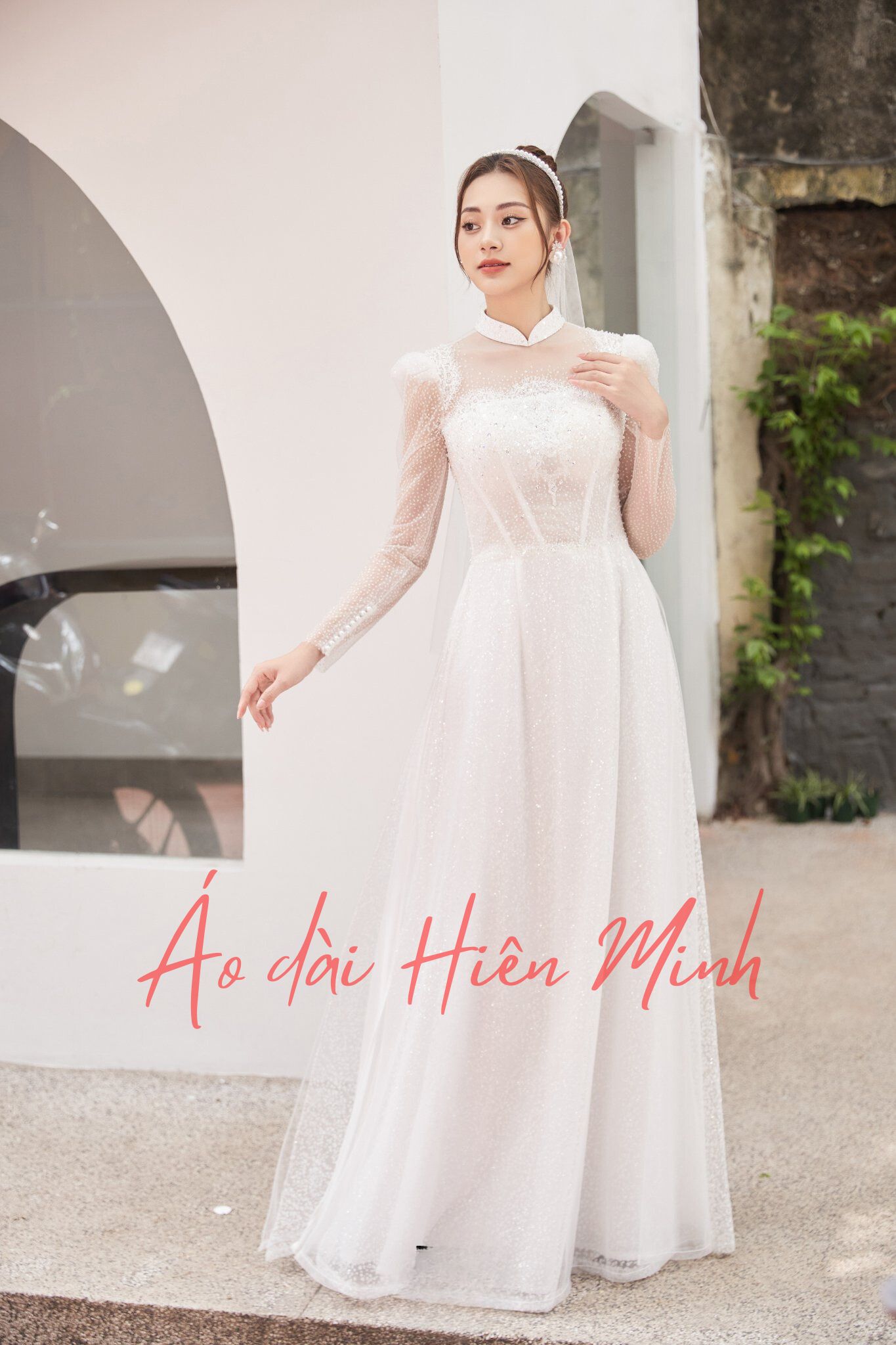 ao dai co dau mau trang dinh da